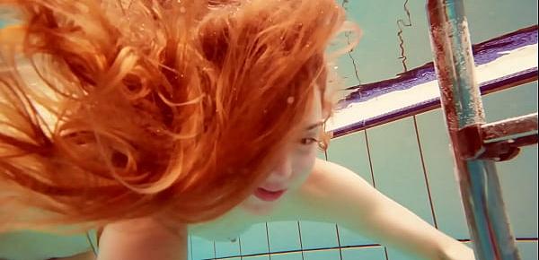 Hairy brunette teen Marketa underwater swimming